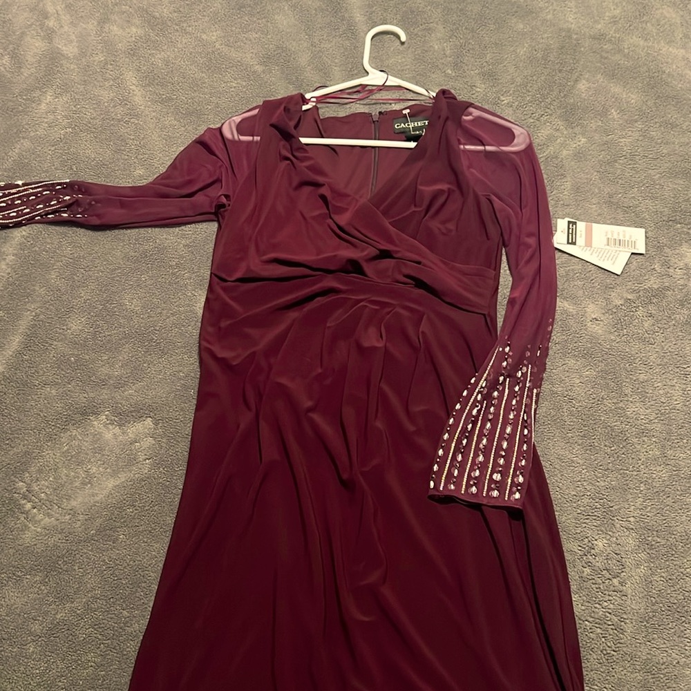 Beautiful cocktail, mini dress with shears sleeves and rhinestones never worn